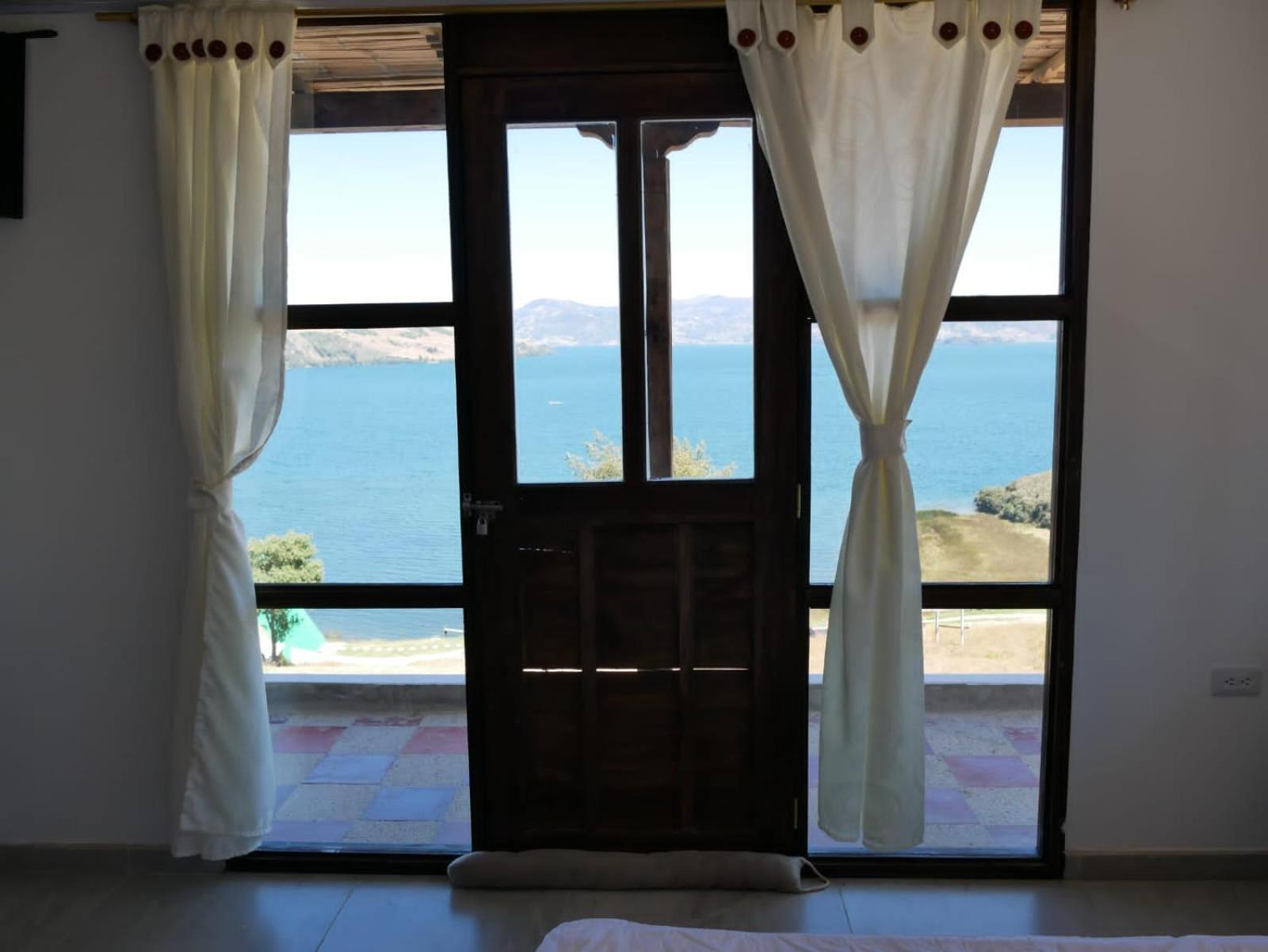 Hotel Tota Eliseo Playa Blanca Lago De Тота Экстерьер фото