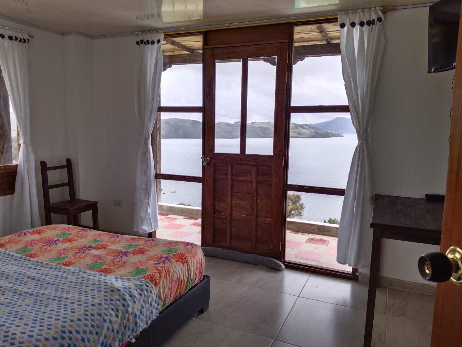 Hotel Tota Eliseo Playa Blanca Lago De Тота Экстерьер фото