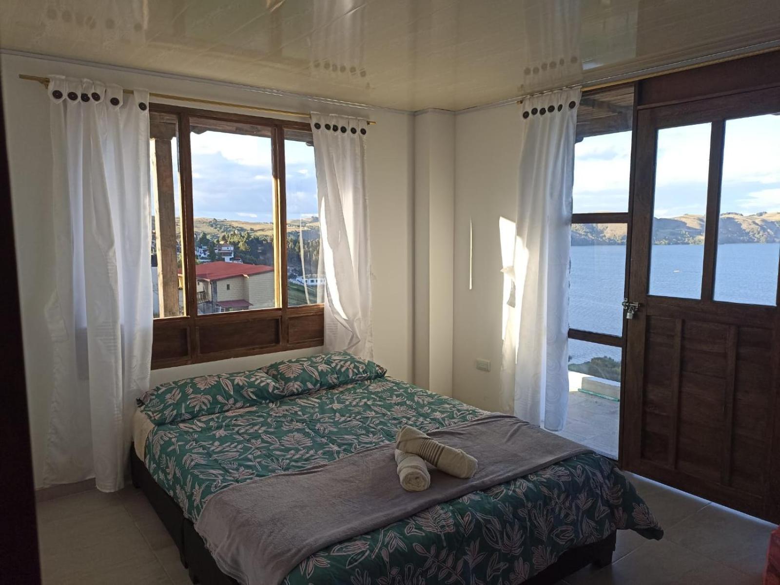 Hotel Tota Eliseo Playa Blanca Lago De Тота Экстерьер фото