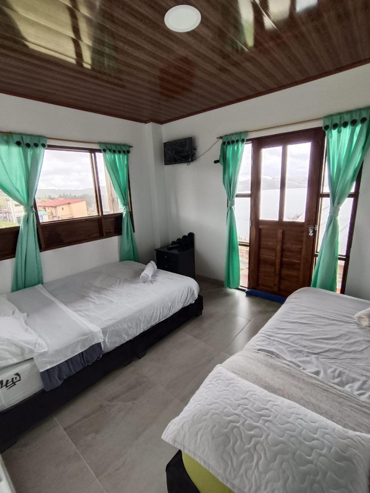 Hotel Tota Eliseo Playa Blanca Lago De Тота Экстерьер фото